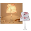 Moderne, schlichte Tischlampe mit Blumenmuster und Eisenvase